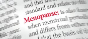 A blurred image with the text "Menopause: when menstrual periods stop and differs from other standard" highlighted in red, related to a menopause survival guide.